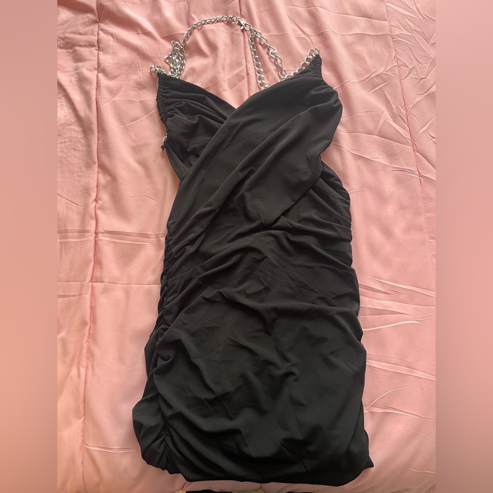Black backless dress with silver chain straps